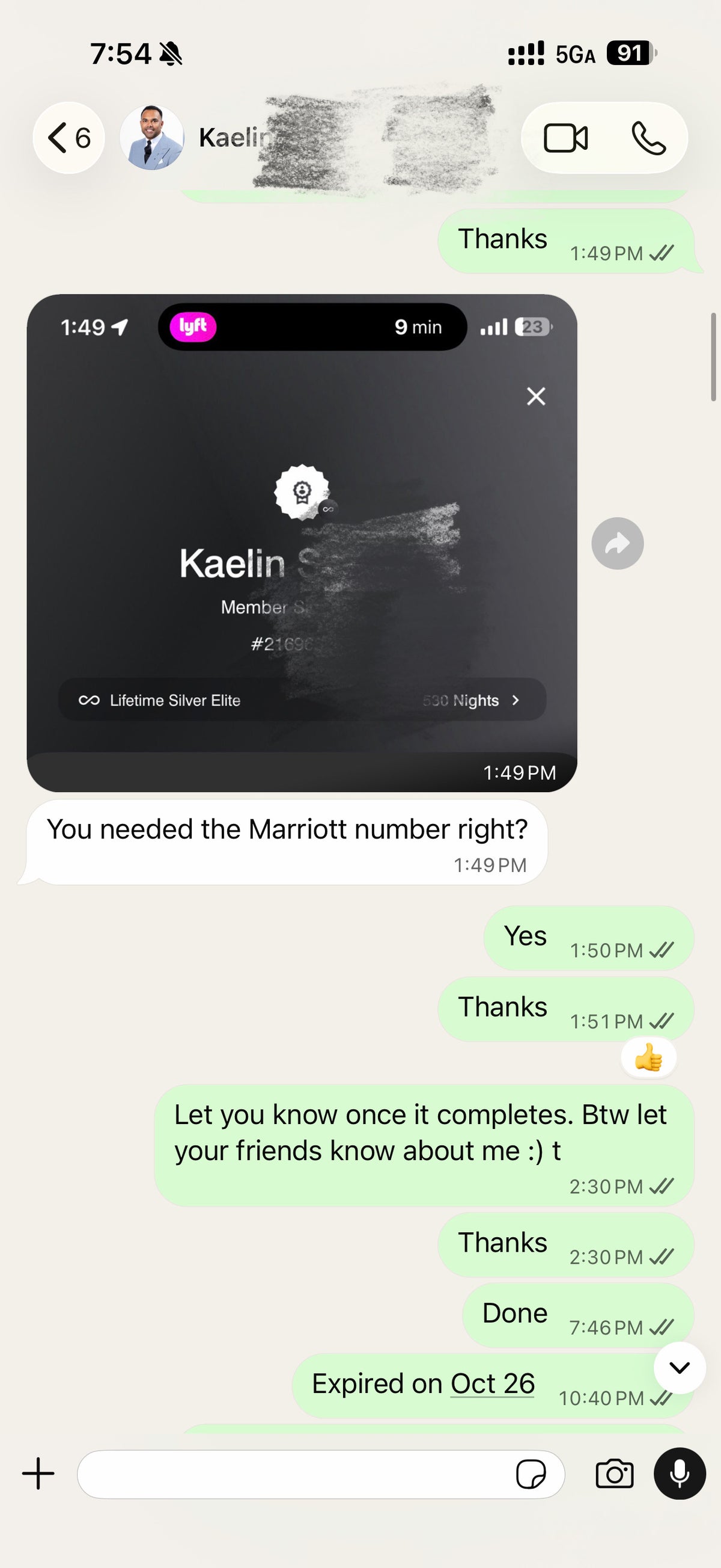 Screenshot of a chat conversation discussing a Marriott loyalty number update.